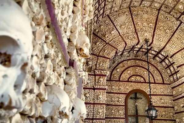 Interior of Faro’s Bone Chapel, showcasing its unique neoclassical design and bone decorations