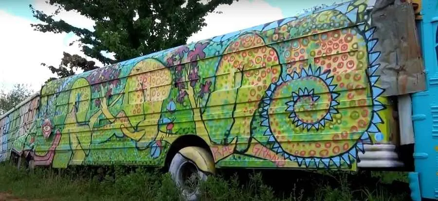 green monster graffiti art School Bus Graveyard in Alto Georgia