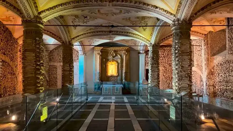 A haunting view of the Chapel of Bones in Évora, where human remains decorate the walls