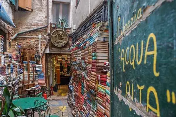 main entrance of the acqua alta bookstore in venice