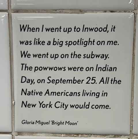 The artwork honors immigrant stories through quotes and mosaics.