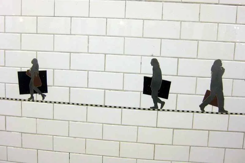 Platform wall art installation "Carrying On" at Prince Street station