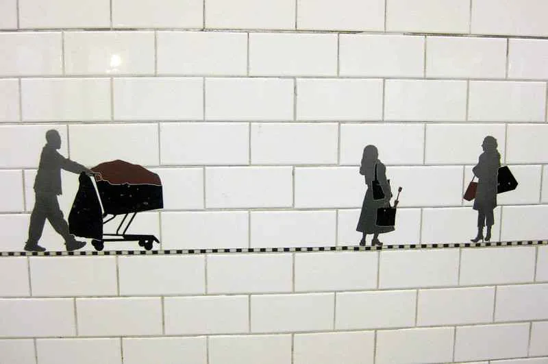 Silhouettes depicting daily life activities at Prince Street station