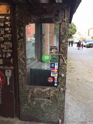 Thousands of keys adorn the facade of Greenwich Locksmiths