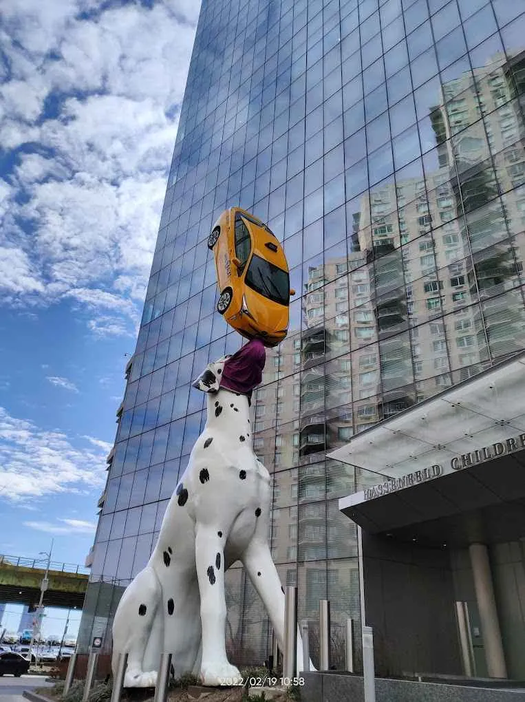 Giant Dalmatian and Yellow Cab