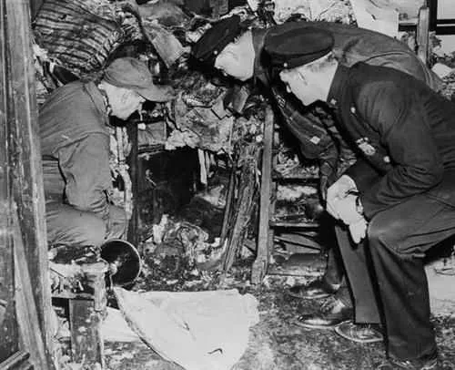 The officers discover Langley's body
