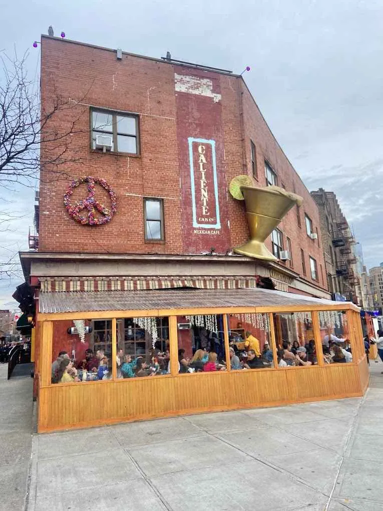 Iconic margarita sculpture on the façade of Caliente Cab Co