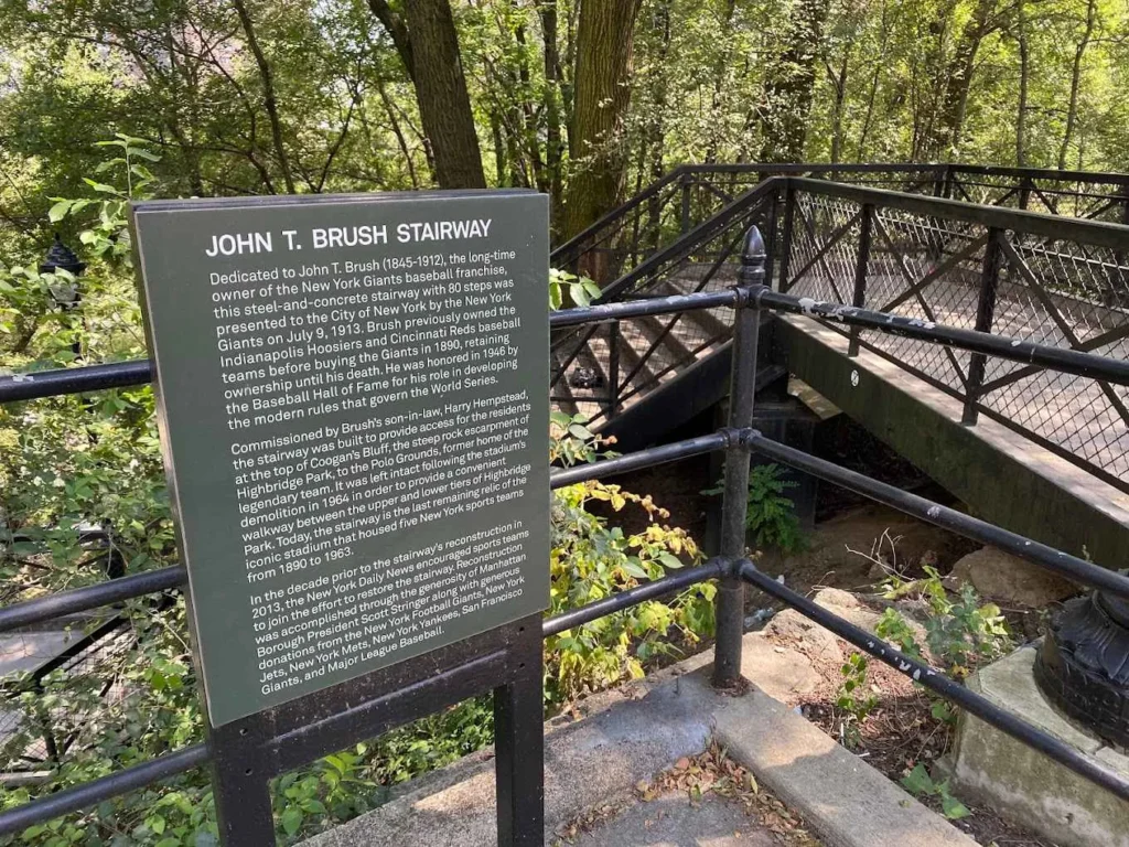 sign with story John t brush stairway