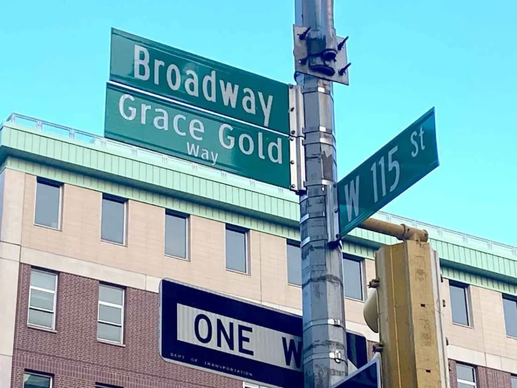 sign at 115th and Broadway for Grace Gold Way