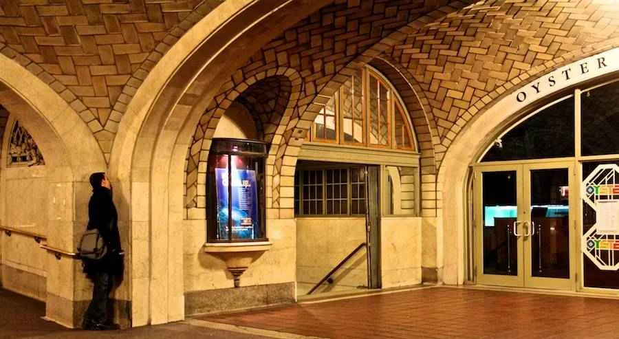 person whispering in the Grand Central Terminal