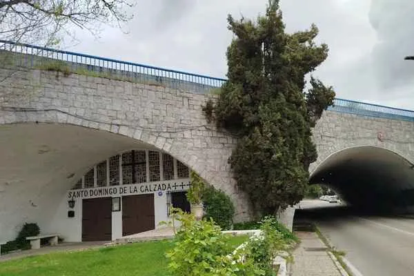 A small chapel hidden beneath an overpass of Madrid’s M-30 highway