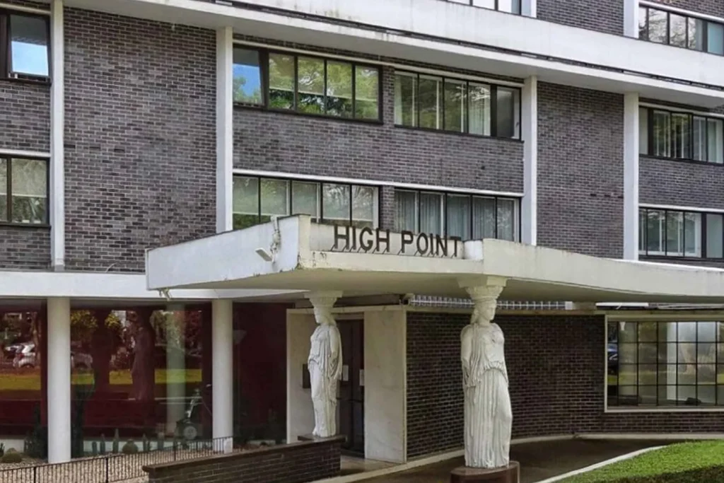 Frontal view of the caryatids decorating Highpoint II’s penthouse, a symbol of British modernism.